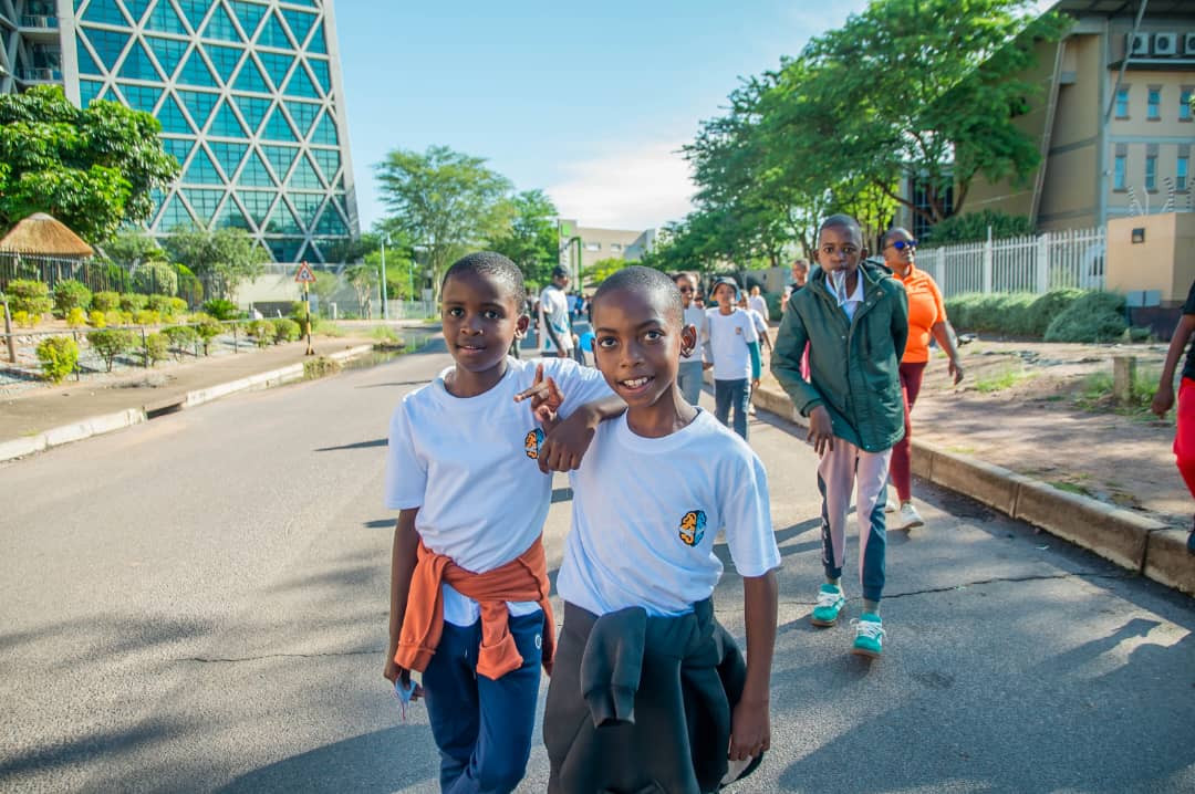 Kids in HKIAO shirts on walk